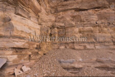 Excavated wall in Green River Stone Company's fossil quarry near Kemmerer, Wyoming, USA, showing rock layers, some of which are rich in fossils of Eocene age from the Green River Formation.